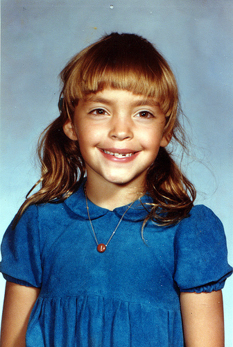 Illustration for article titled Goofy Glasses, Pretty Pigtails & Snaggletooth Smiles: September Is For School Portraits